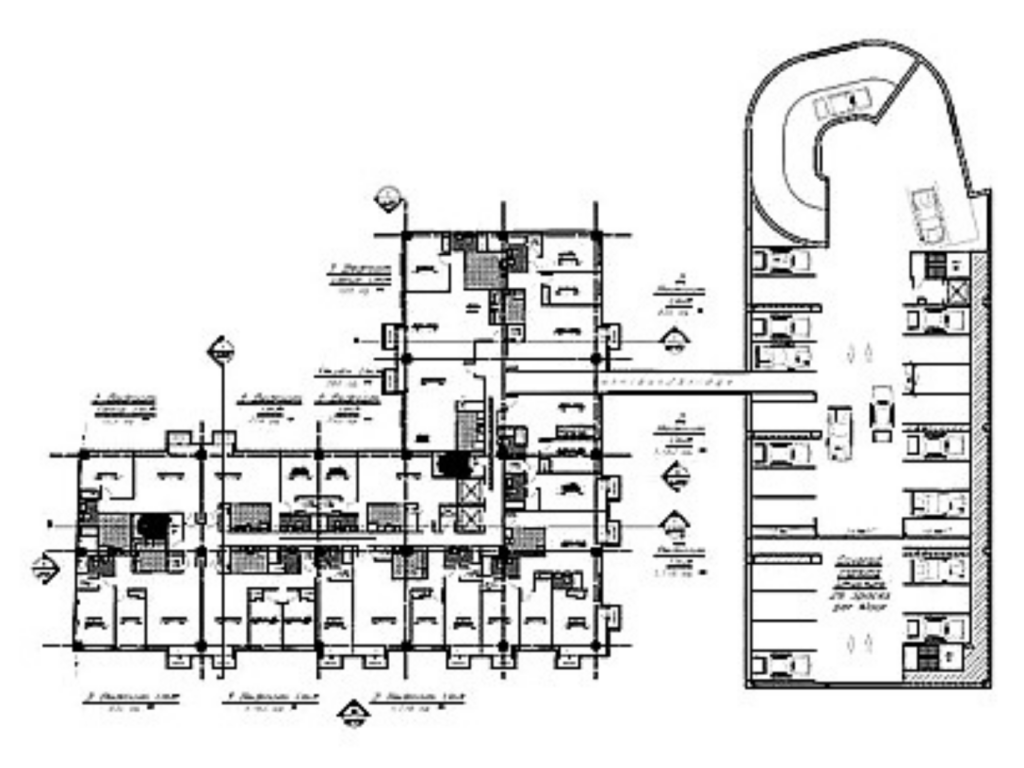 Architectural plan showing the relationship between residential building wings, connecting corridors, elevators, and adjacent parking facilities.
